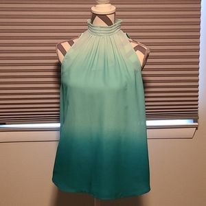 Sleeveless high neck top